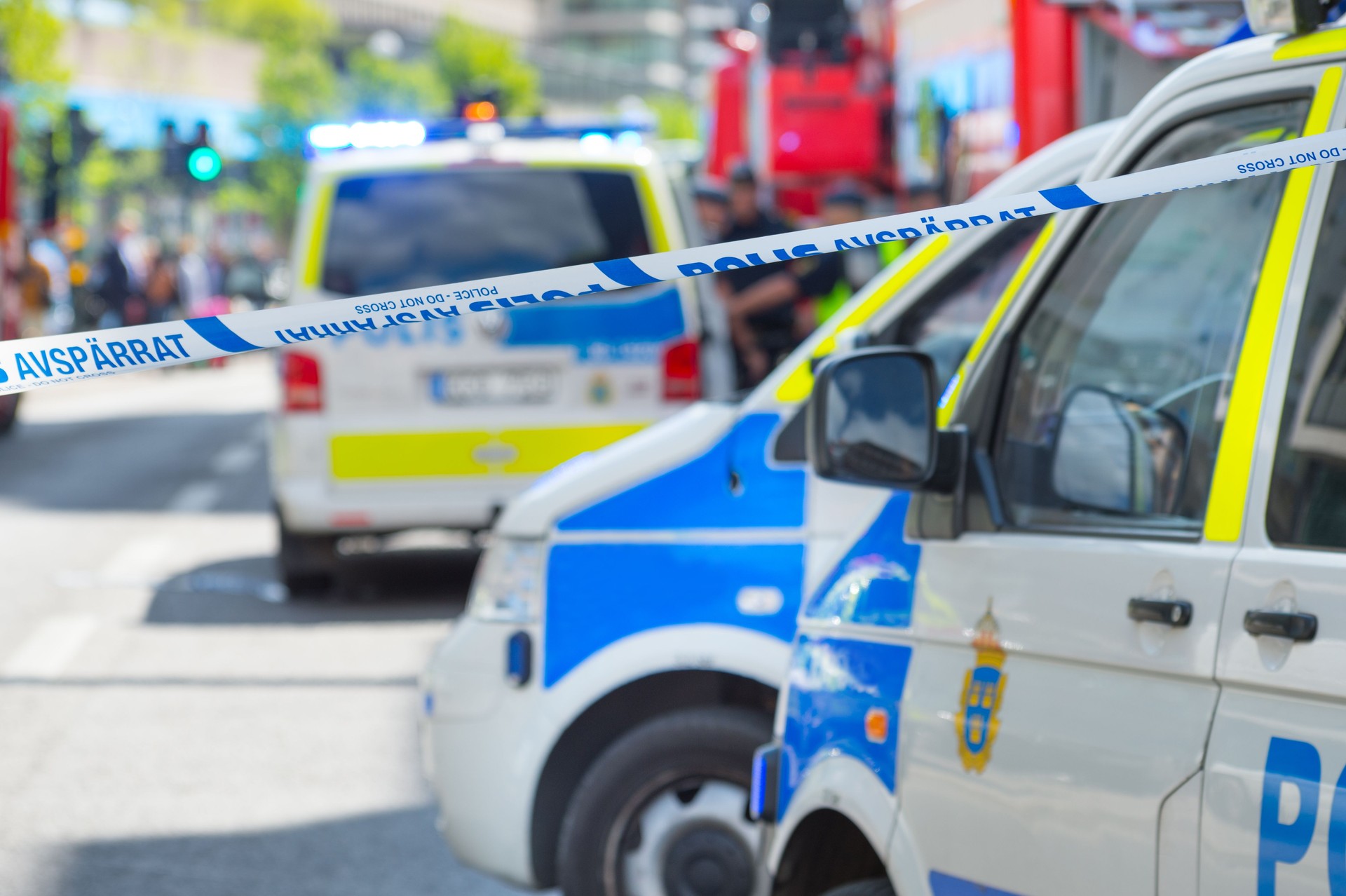 Ambulances and police cars in Stockholm, police line, do not cross